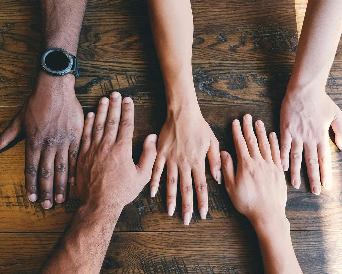 group-of-diverse-hands-coming-together